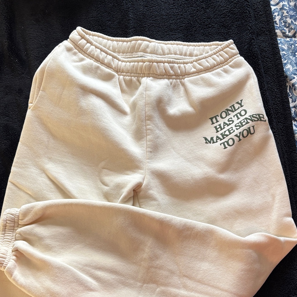 Happy Camper: Cream Sweatpants With Inspirational Text